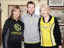  ??  ?? John Travers winner of the 10k race with Denise Gilmartin and Maureen Haran