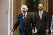  ?? ALEX BRANDON - THE ASSOCIATED PRESS ?? Senate Majority Leader Mitch McConnell of Ky., left, walks from the Senate Floor on Capitol Hill, Tuesday, Feb. 4in Washington.