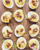  ?? JOE LINGEMAN/TNS ?? Sage is the star of these deviled eggs.