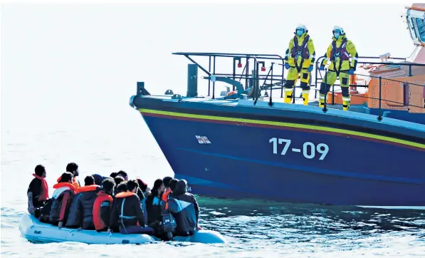  ??  ?? A boat carrying 25 people intercepte­d in the Channel was just one of five vessels from which migrants were rescued yesterday. 1,560 migrants have used small boats to cross from France to the UK so far this year