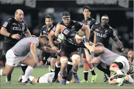  ??  ?? ON THE CHARGE: Sharks flank Jean-luc du Preez looks for a way through the Kings defence as teammates Lourens Adriaanse, Cobus Reinach,thomas du Toit, Kobus van Wyk and Chiliboy’ Ralepell loom in support during yesterday’s uper rugby match at Kings Park.