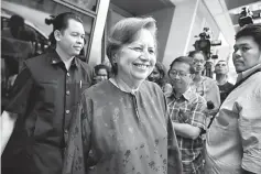  ??  ?? Zeti believes the Asian economy, including Malaysia, will remain resilient amid the ongoing trade war between the US and China. — Bernama photo