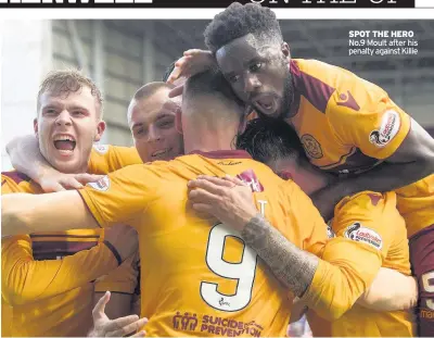  ??  ?? SPOT THE HERO No.9 Moult after his penalty against Killie