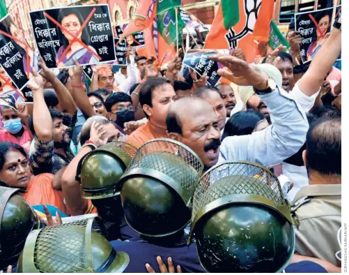  ?? ?? BJP MEMBERS PROTESTING against Mahua Moitra’s comments on Kali worship, in Kolkata on July 13.