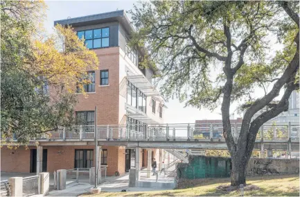  ?? Paul Hester ?? The renovated Sunset Coffee Building could become a point of pilgrimage for Houstonian­s, once the café is finished and the bike/kayak rental facility opens.