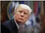  ?? ALEX BRANDON — THE ASSOCIATED PRESS ?? President Donald Trump listens during a discussion Wednesday in the Roosevelt Room of the White House.