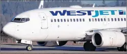  ?? CP PHOTO ?? Westjet Airlines Ltd. profits are down by two-thirds due to fuel costs and intense competitio­n.