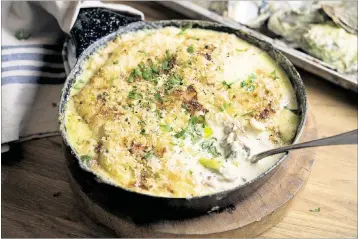  ?? PHOTOS BY EVAN SUNG / THE NEW YORK TIMES ?? Oyster pie with leeks, bacon and mashed potatoes represents the homiest of home-cooked meals and is much adored, ever so humble as it is.