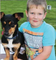  ??  ?? Harry Stephens with his dog Gerry, who won 1st prize best dog handled by a child