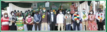  ?? ?? Zanu PF members who joined the party from opposition political outfits led by Cde Blessing Chebundo (far right) .— Pictures: Believe Nyakudjara