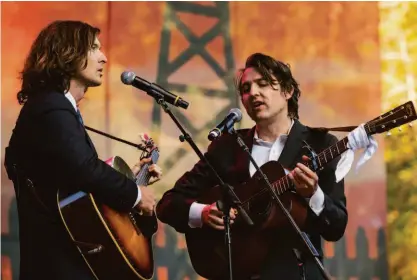  ?? Brian Feulner / Special to The Chronicle ?? The Milk Carton Kids, pictured here performing at the 2019 Hardly Strictly Bluegrass festival, are scheduled to play Oct. 18 at Bimbo’s 365 Club in San Francisco.