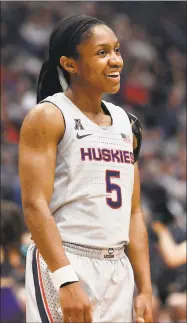  ?? Jessica Hill / Associated Press ?? Crystal Dangerfiel­d and UConn face Temple in the AAC tournament on Saturday.