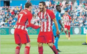  ?? FOTO:EFE ?? La sociedad Koke-Griezmann fue clave para llevarse el triunfo en el Coliseum