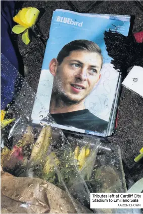  ?? AARON CHOWN ?? Tributes left at Cardiff City Stadium to Emiliano Sala