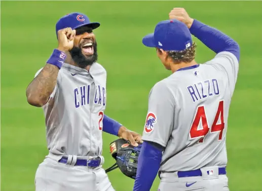  ?? TONY DEJAK/AP ?? Cubs right fielder Jason Heyward (left) sat out the game against the Tigers on Wednesday in protest, but his teammates, including Anthony Rizzo, played.