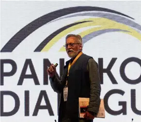  ??  ?? 2017. Prof Anil giving his keynote address at Pangkor Dialogue Making his point: