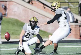  ?? AP ?? Vanderbilt’s Sarah Fuller kicks off to start the second half against Missouri on Saturday.