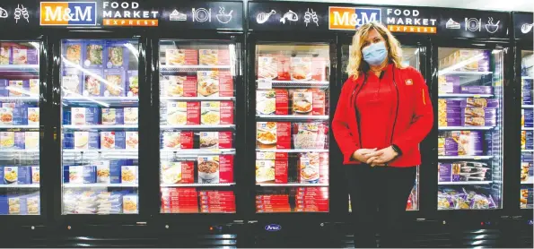  ?? Damon MacLean ?? Elmira Home Hardware owner Krista McBay has added an M&M Food Market Express section to her store.