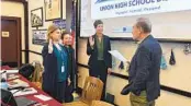  ?? MIQUEL JACOBS ?? New trustees (from left) Rimga Viskanta, Phan Anderson and Jane Lea Smith take the oath of office.