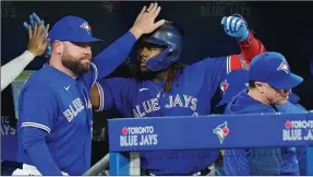  ?? ?? The Canadian Press
Toronto Blue Jays first baseman Vladimir Guerrero Jr. and his fellow Blue Jays will be in the hunt for post–seson glory.