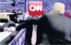  ??  ?? SINISTER Trump shares a bizarre spoof video of himself beating up CNN