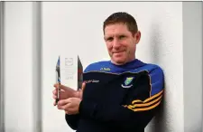  ??  ?? Mick O’Rourke with his Manager of the Month award for February.