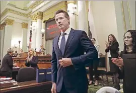  ?? Rich Pedroncell­i Associated Press ?? GOV. Gavin Newsom after his State of the State address. Comparing goals outlined in his early major speeches with legislativ­e results shows a mixed record.