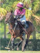  ?? CANDACE FERREIRA ?? Shariah Harris and her Work To Ride/ Grand Champions are in the U.S. Open Polo semifinals.
