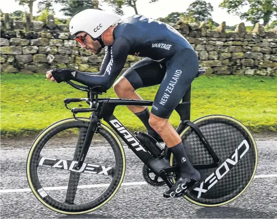  ?? PHOTO: ROBERT JONES ?? On the fly . . . New Zealand cyclist Patrick Bevin gives it everything in the elite men’s time trial at the UCI Road World Championsh­ips in Yorkshire yesterday.