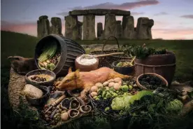  ?? Photograph: Andre Pattenden/PA ?? An artist’s impression of some of the food consumed by the builders of Stonehenge.