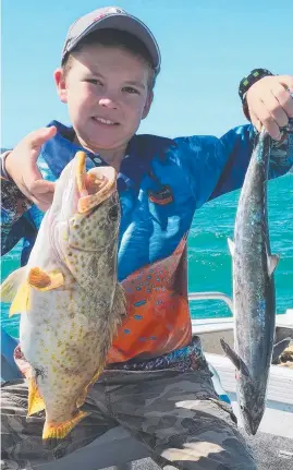  ?? BRAVE CATCH: Jarrod Coleman with his cod and mackerel. ??