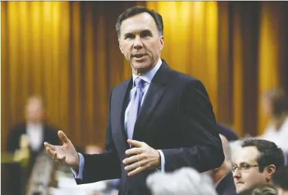  ?? BLAIR GABLE/REUTERS ?? Finance Minister Bill Morneau said Canada wants to ensure “digital companies pay their fair share of taxes in our country.”