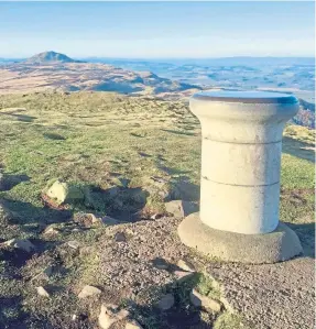  ??  ?? The summit of East Lomond looking towards West Lomond.