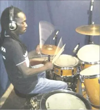  ??  ?? Drummer Gully Ncube doing what he knows best