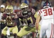  ?? ASSOCIATED PRESS FILE ?? Florida State offensive lineman Roderick Johnson (77) could be on the Browns’ radar as a second-round pick.