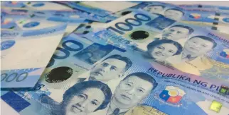  ?? BW FILE PHOTO ?? DEPOSITS with banks surged to breach the P10-trillion mark last year.