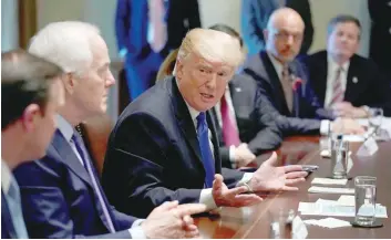  ?? — Reuters ?? President Donald Trump meets with bi-partisan members of Congress to discuss school and community safety in the wake of the Florida school shootings at the White House.