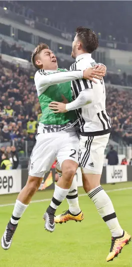  ?? GETTY IMAGES ?? Alvaro Morata festeggiat­o da Dybala. L’argentino poi entrerà in campo e farà il 3-0