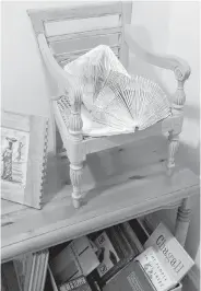  ??  ?? There are many permutatio­ns of book folding, an art form that involves folding pages of a hardcover book within the book’s own binding.