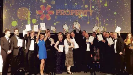  ?? PICTURE: ROB MCDOUGAL ?? 0 The winners of the 2017 Scottish Property Awards with their trophies.