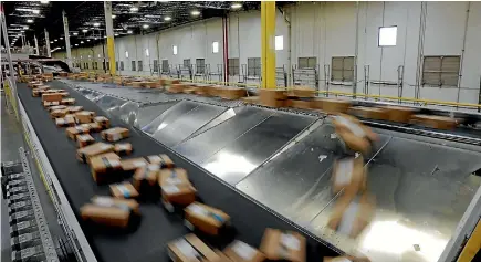  ?? PHOTO: REUTERS ?? The US giant’s Fulfillmen­t By Amazon service means companies can have their goods shipped while retaining control over pricing and marketing.