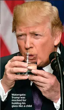  ??  ?? Watergate: Trump was mocked for holding his glass like a child