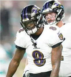  ?? LYNNE SLADKY/AP ?? The Ravens downgraded quarterbac­k Lamar Jackson to questionab­le because of a non-COVID illness. He’s reportedly 50-50 to play Sunday.