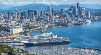  ?? ?? Seattle skyline with Holland America's Eurodam cruise ship