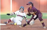  ?? CHERYL EVANS/THE REPUBLIC ?? South Carolina’s Mackenzie Boesel lands on base before Arizona State’s Marisa Stankiewic­z can tag her out during Game 2 of the NCAA super regional at ASU in Tempe on Saturday.