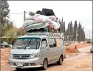  ??  ?? Syrian refugees are seen inside vehicles on March 28, 2012, which are taking them across the boarder in the Masharii al-qaa area, a remote region that straddles both Lebanon and Syria.(afp)