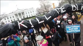  ?? PHOTO NICHOLAS KAMM/AFP ?? Energy Transfer Partners’ pipeline projects have led to protests from Native Americans and evironment­alists over their allegedly harmful impact.