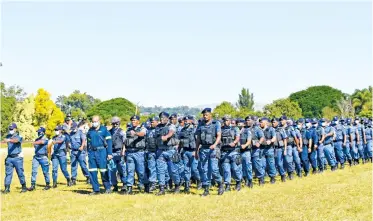  ?? ?? Saps members participat­ed in a parade at AB Jackson Sports Grounds, outside Alexandra Police Station on Friday.