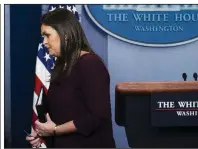  ?? The New York Times/DOUG MILLS ?? White House spokesman Sarah Huckabee Sanders (left) said Tuesday that she could not guarantee that President Donald Trump had never used a racial slur but stressed that Trump has denied it. Former White House staff member Omarosa Manigault Newman (right, in March 2017) contends he did and faces a breach of confidenti­ality agreement claim by the Trump campaign. “I will not be silenced. I will not be intimidate­d. And I’m not going to be bullied by Donald Trump,” Manigault Newman said.