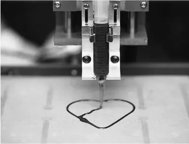  ?? Chris Ratcli ffe / Blomb erg news ?? A 3-D printer creates a heart using chocolate during a 3-D Print show at the Business Design Centre in London, England. It’s OK to tell entreprene­urial grads to follow their heart, but the challenge often can be in uncovering exactly what that is, then...